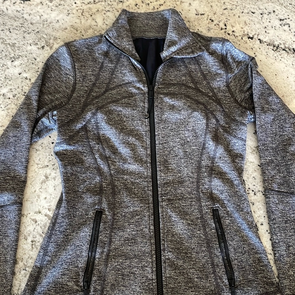 Define Jacket in perfect condition, no rips, tears or stains. Size 8
